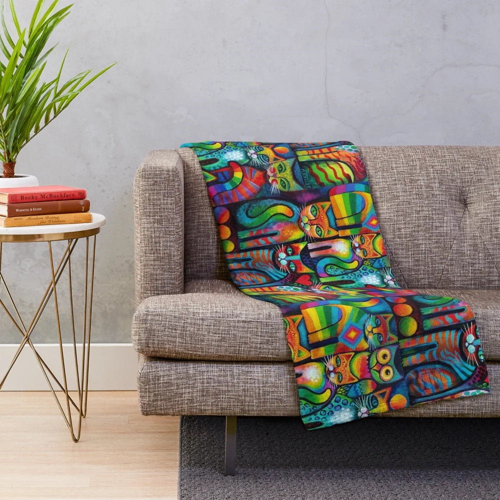 Whimsical plush blanket featuring a colorful illustration of a cat and owl