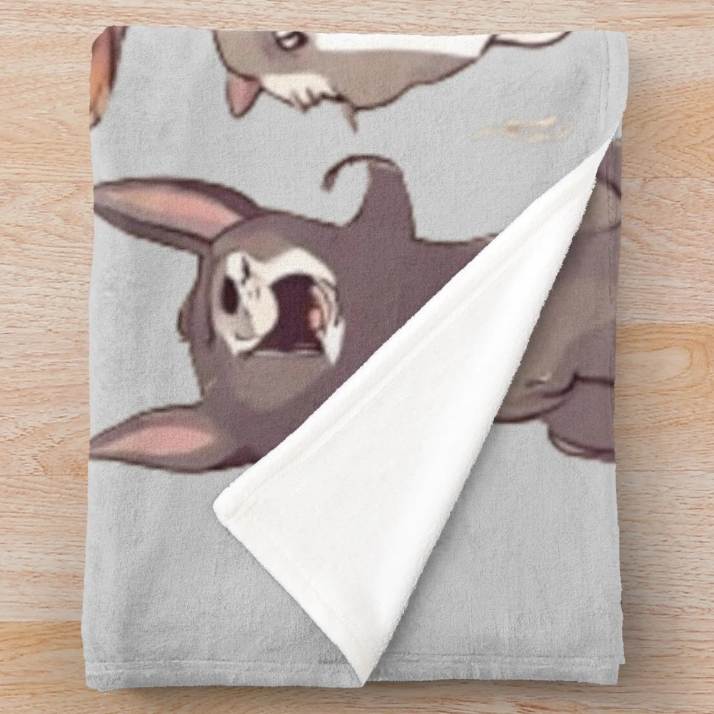 Colorful animal plush blanket with cute, whimsical forest creature designs