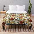 Plush blanket with a whimsical design of dancing animals and floral patterns
