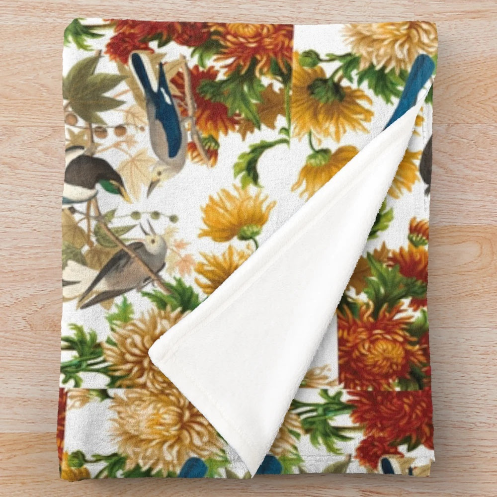 Plush blanket with a whimsical design of dancing animals and floral patterns