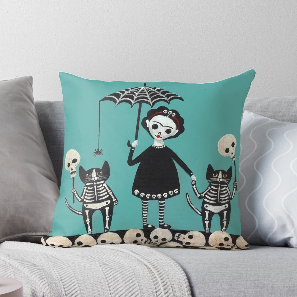 Colorful Day of the Dead pillow featuring playful skeletal cats in a whimsical folk art design.