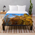 Colorful dragon-themed plush blanket with vibrant abstract patterns