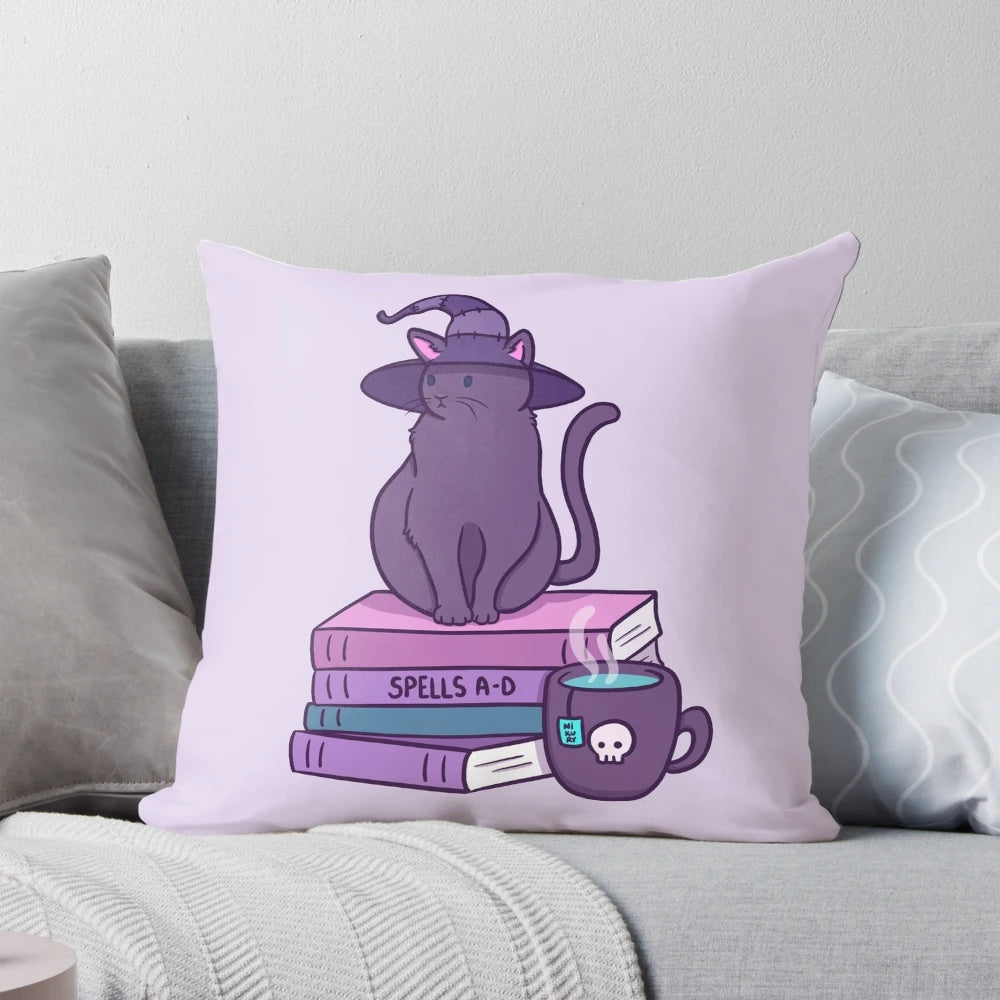 A soft, plush pillow featuring a whimsical illustration of a cat witch with a purple and pastel color scheme.