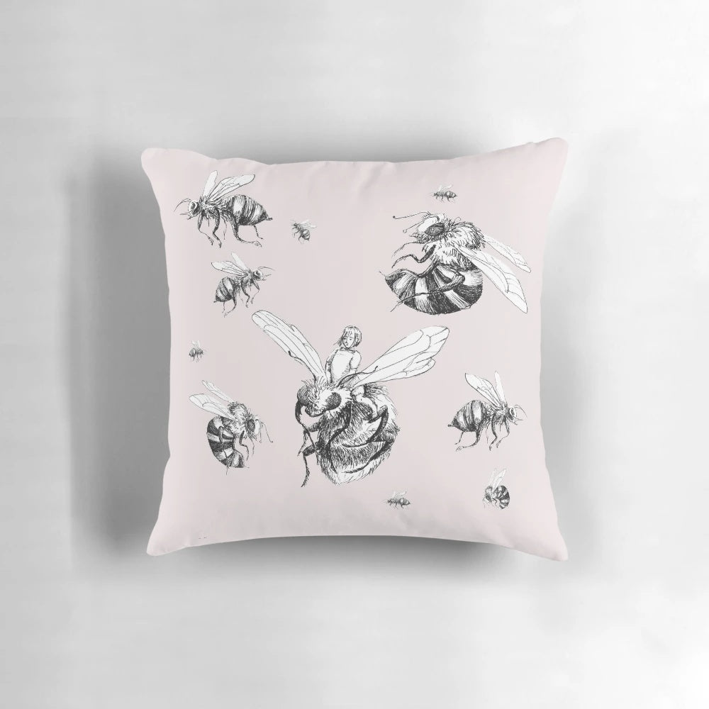 Vintage-inspired black and white ink illustration of a bumblebee on a decorative pillow for children's rooms and home decor.