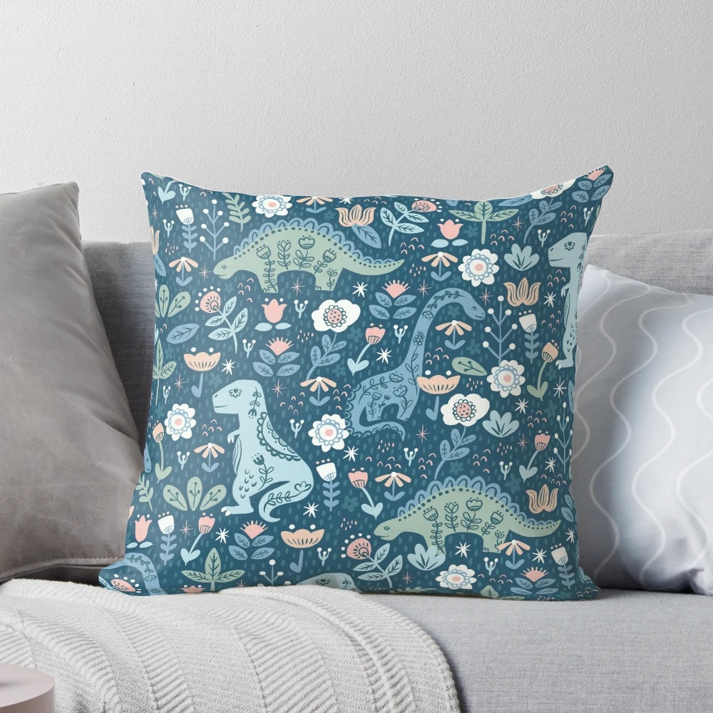 A decorative throw pillow featuring a colorful, folk-inspired dinosaur design in shades of blue.