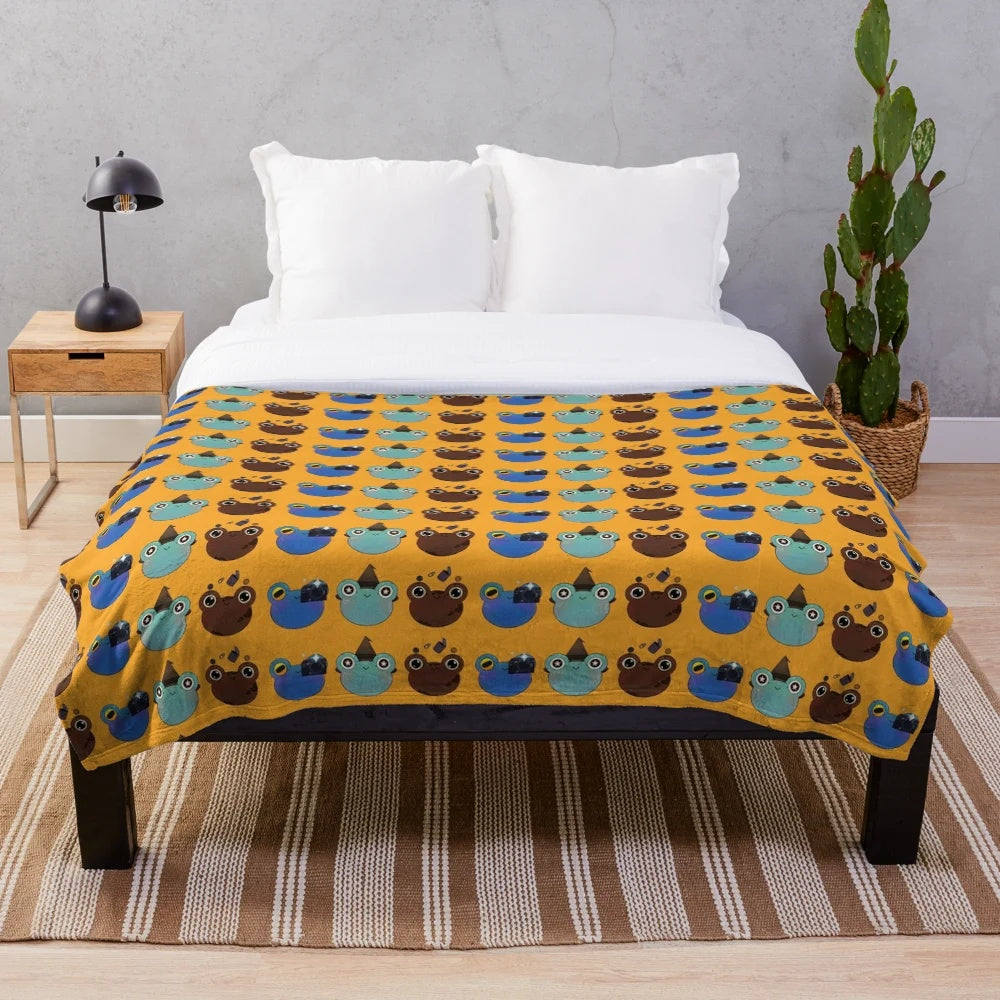 Hobbies for Froggies plush blanket featuring a trio of frog friends engaged in various hobbies like metal detecting, photography, and witchcraft