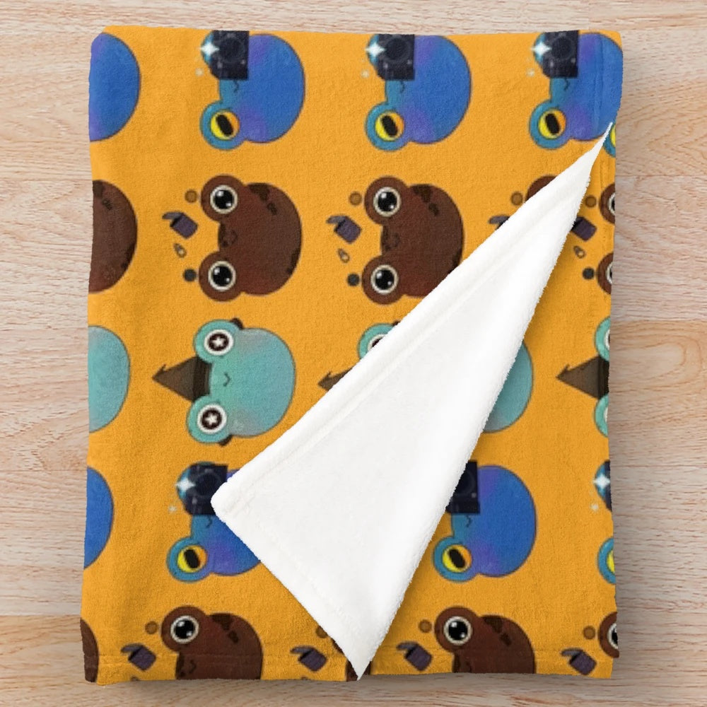 Hobbies for Froggies plush blanket featuring a trio of frog friends engaged in various hobbies like metal detecting, photography, and witchcraft
