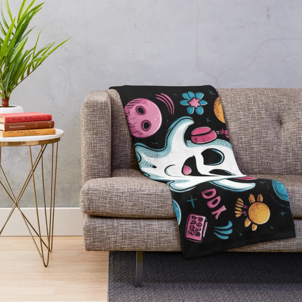 Cute ghost plush blanket featuring a ghost grooving to music with headphones
