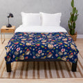 Cozy plush blanket featuring a watercolor hedgehog design with autumn florals and botanicals