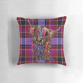 Colorful pillow featuring a highland cow in a tartan and sunflower design