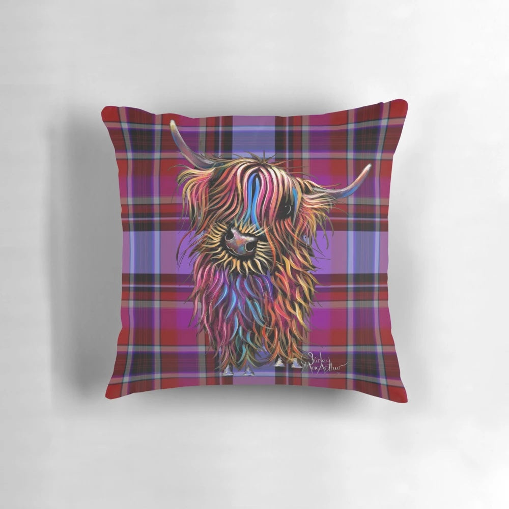 Colorful pillow featuring a highland cow in a tartan and sunflower design