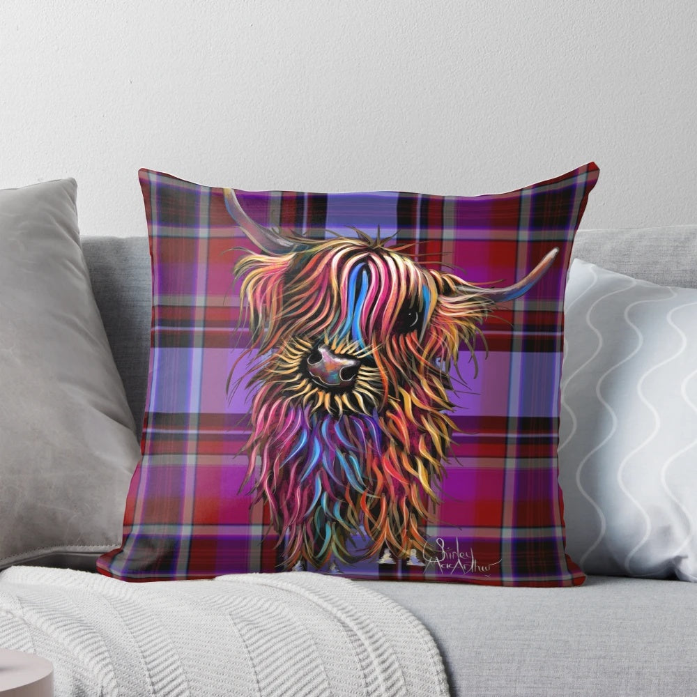 Colorful pillow featuring a highland cow in a tartan and sunflower design