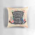 Mad Hatter inspired decorative pillow featuring a whimsical watercolor design with silhouettes, floral elements, and steampunk gears.