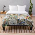 Plush blanket featuring medieval fantasy animals playing musical instruments in a floral setting