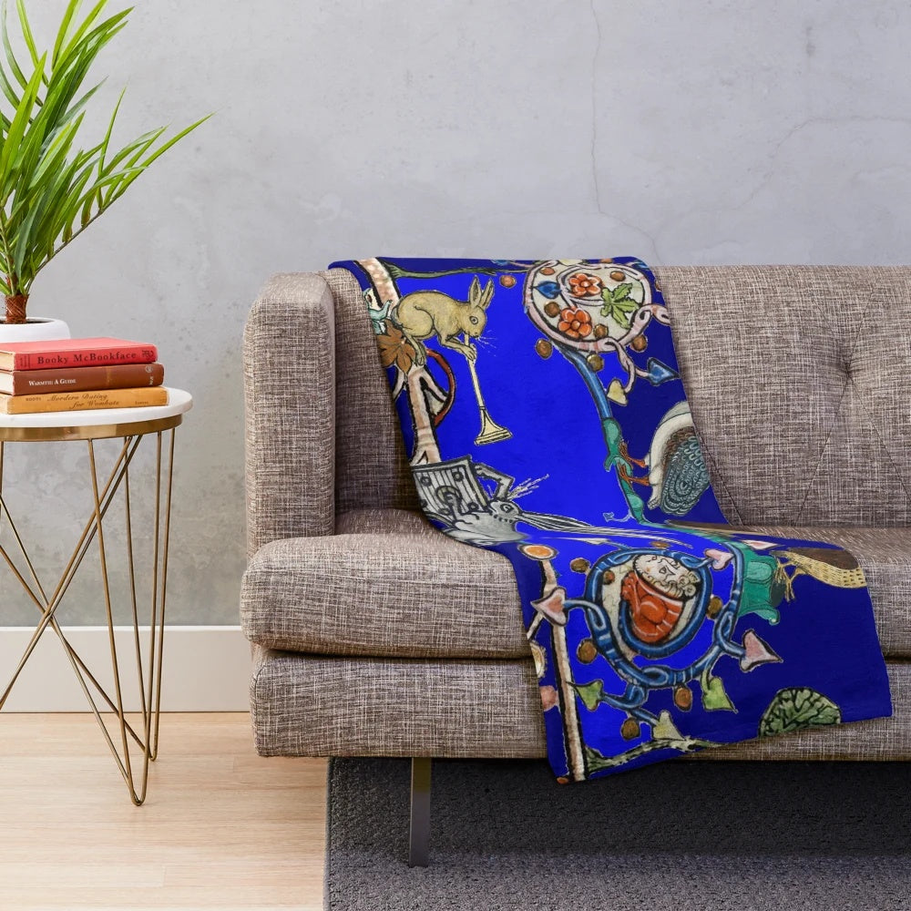 Whimsical medieval bestiary plush blanket featuring owls and rabbits playing musical instruments under a crescent moon