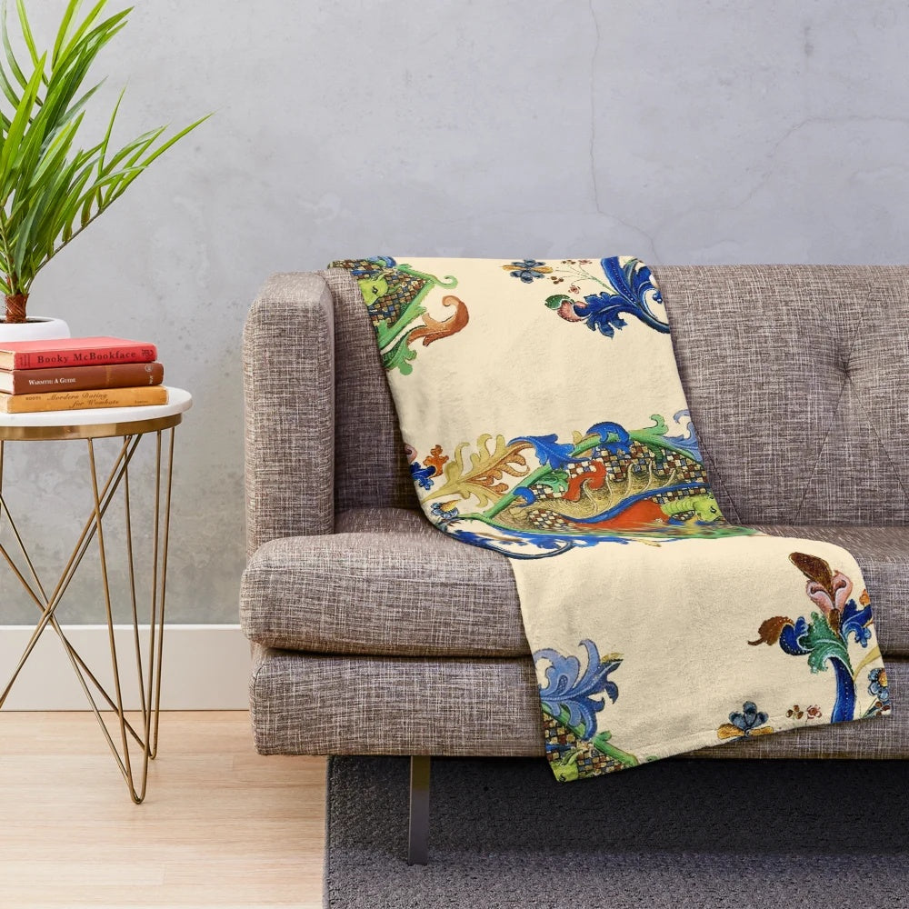 Plush blanket featuring a green dragon playing a flute from a medieval bestiary