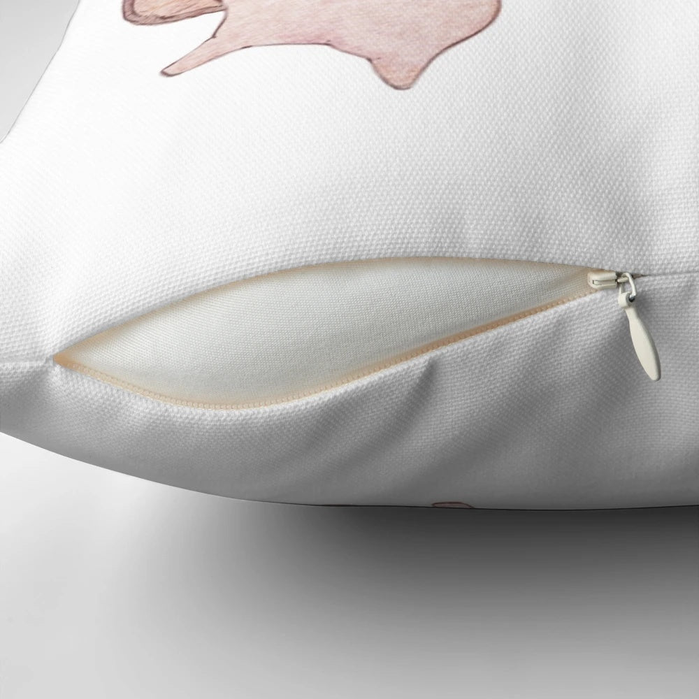Four adorable mushroom characters on a soft, decorative pillow for a fairy tale-inspired room.