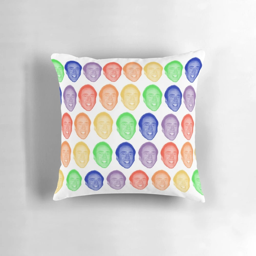 Colorful rainbow pattern pillow with a playful image of actor Nicholas Cage