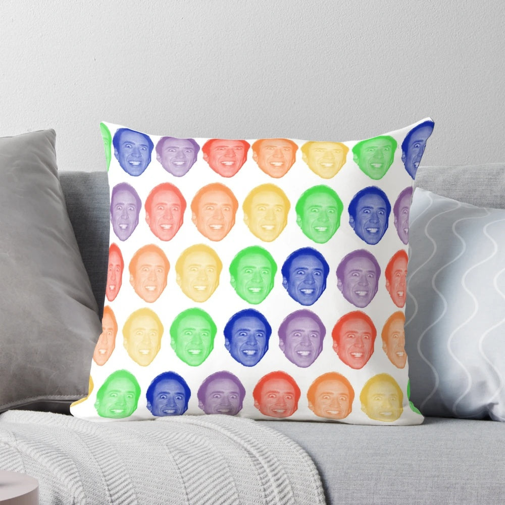 Colorful rainbow pattern pillow with a playful image of actor Nicholas Cage