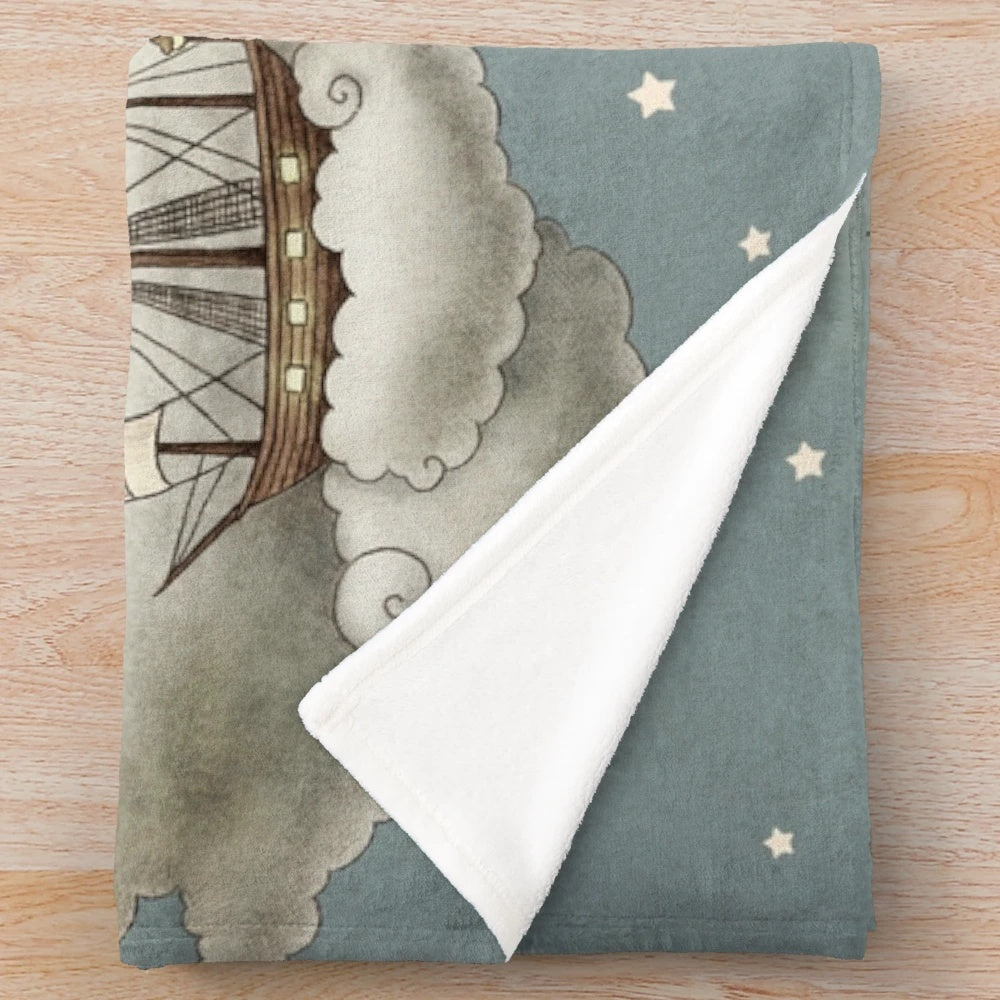 Whimsical ocean plush blanket with surreal skies and nature elements
