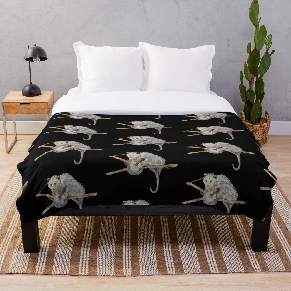 Soft, cozy plush blanket featuring a watercolor illustration of a trash-loving opossum playing the banjo.
