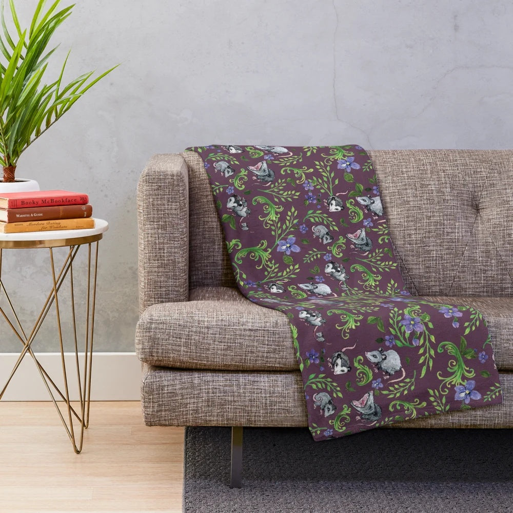 Opossum, fern, and violet print plush blanket