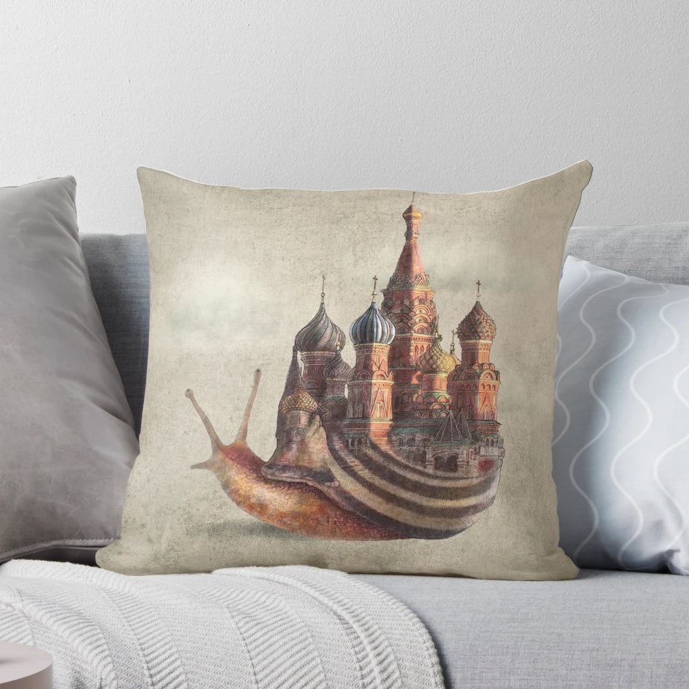 Whimsical and surreal pillow featuring a snail design with architectural and inspirational elements