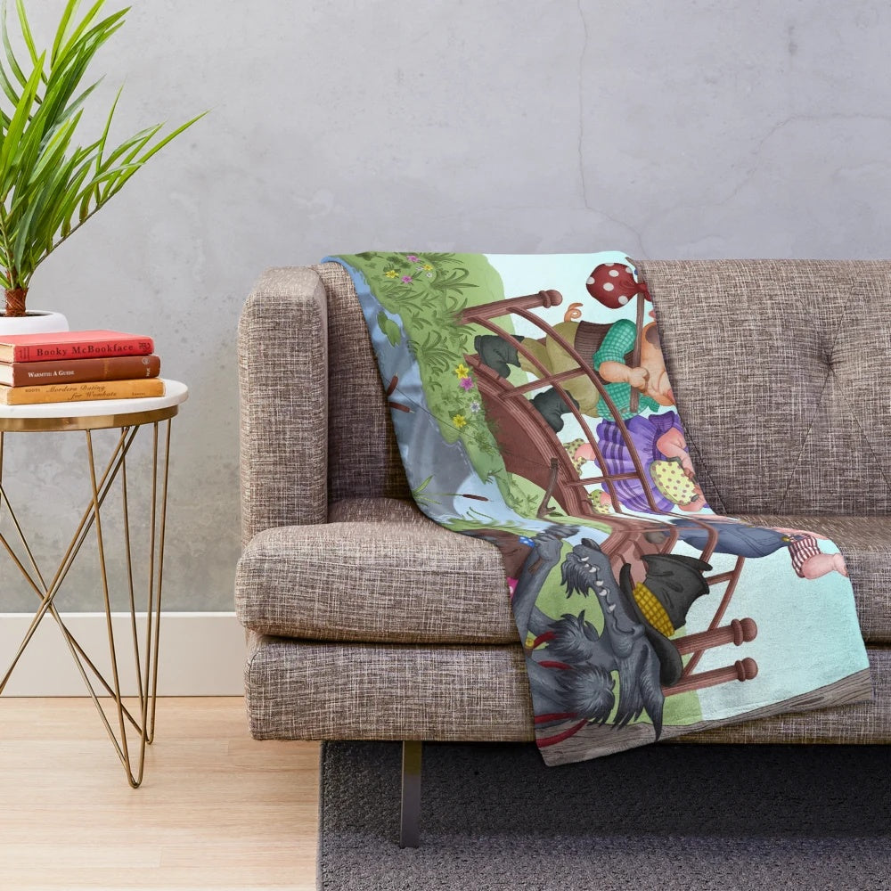 Whimsical illustration of the Three Little Pigs on a soft plush blanket