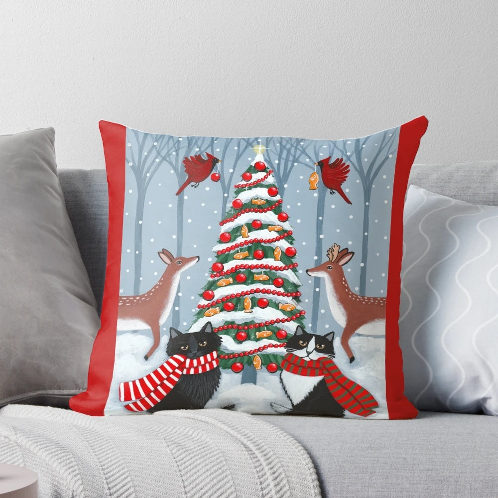 Tuxedo cat and black cat sitting on a snowy Christmas tree in a whimsical woodland scene