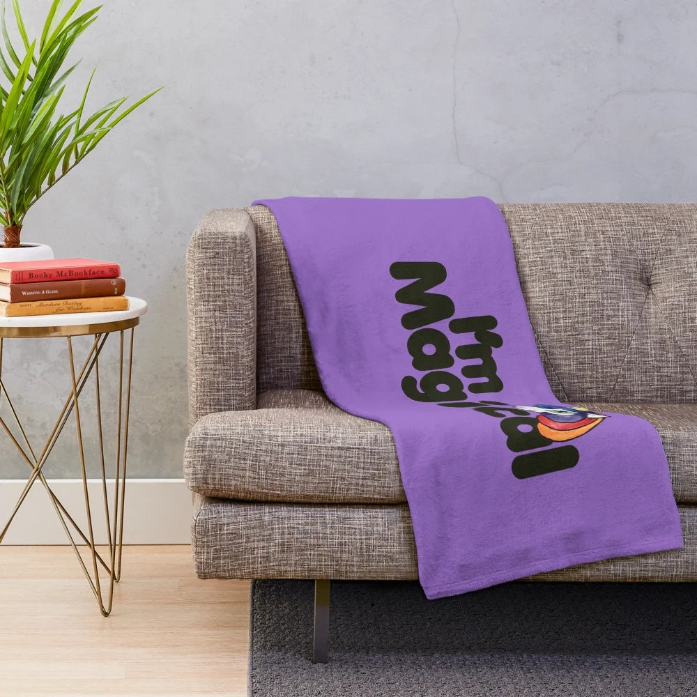 Colorful unicorn plush blanket with whimsical art