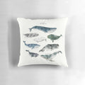 Colorful watercolor painting of whales on a soft, cozy pillow