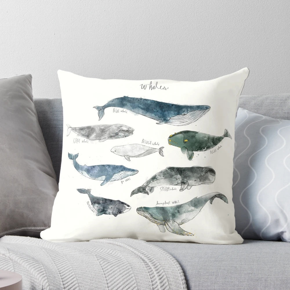 Colorful watercolor painting of whales on a soft, cozy pillow