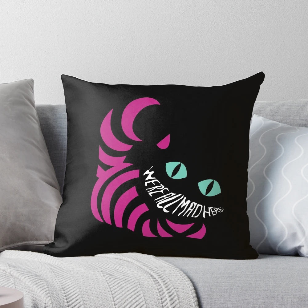 Whimsical 'We're All Mad Here' Alice in Wonderland inspired throw pillow with Cheshire cat graphic