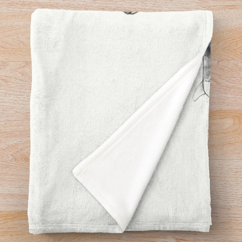 Whimsical watercolor whales design on a soft and cozy plush blanket