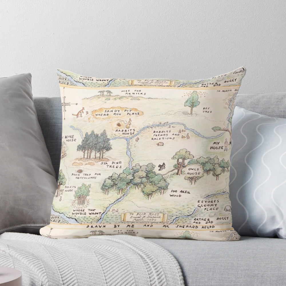 Colorful decorative pillow featuring a map of the Hundred Acre Wood from Alice in Wonderland