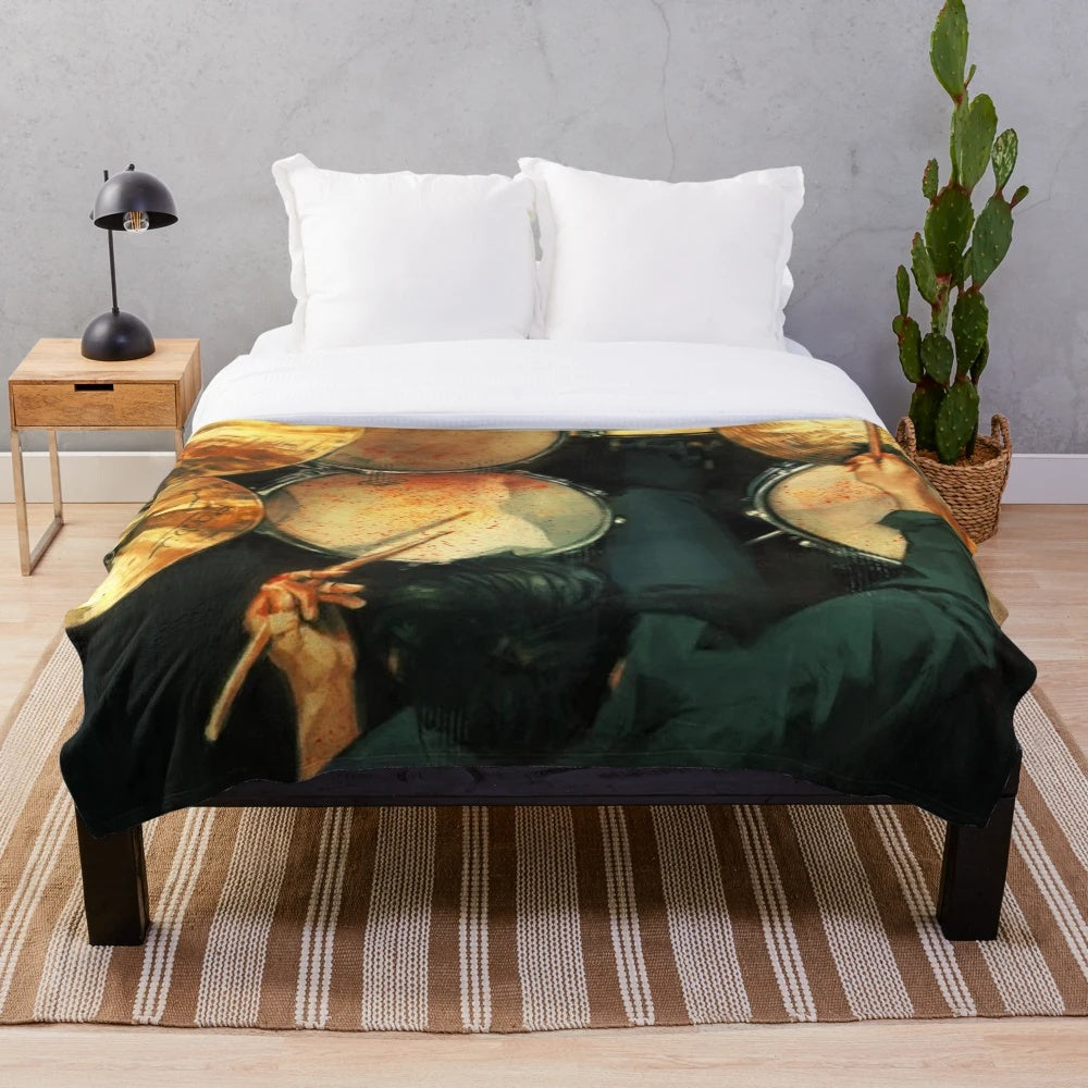 Whiplash-inspired plush blanket featuring artistic design and quotes from the acclaimed film