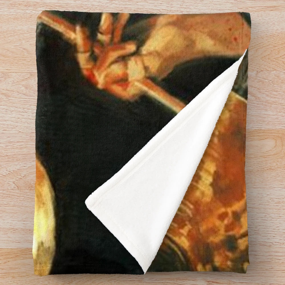 Whiplash-inspired plush blanket featuring artistic design and quotes from the acclaimed film