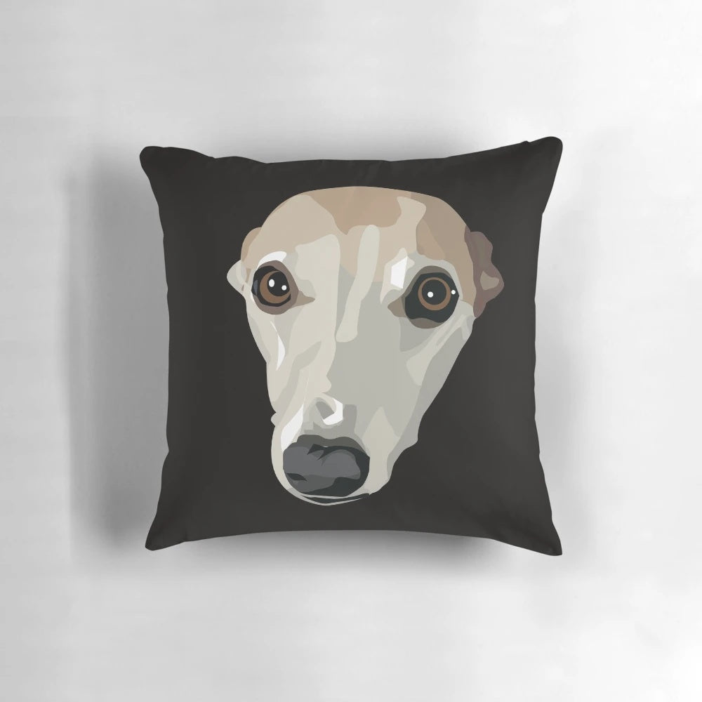 Fawn-colored whippet or hound breed dog on a soft, plush pillow