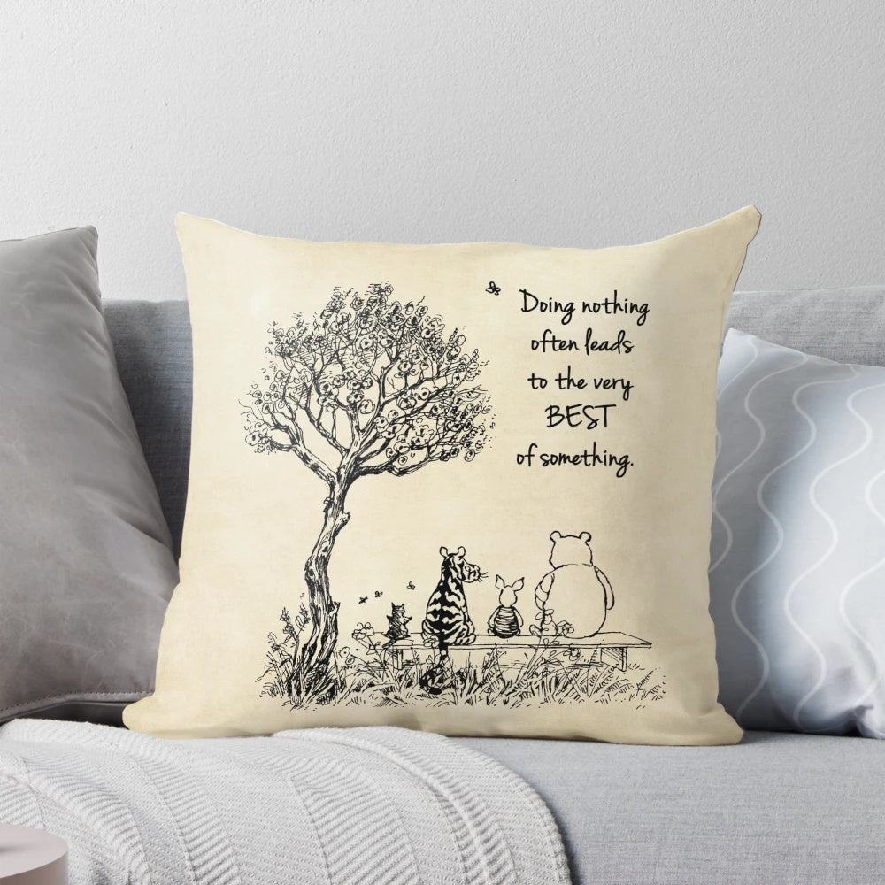 Winnie the Pooh, Piglet, Tigger, and friends pillow featuring a "Doing Nothing" quote