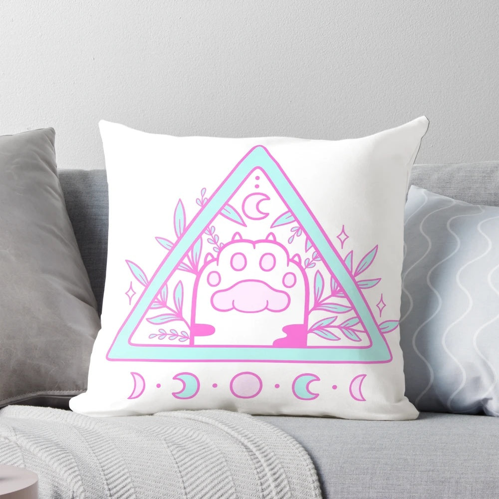 Pastel white and pink cat paw print Nikury pillow with occult and moon motifs