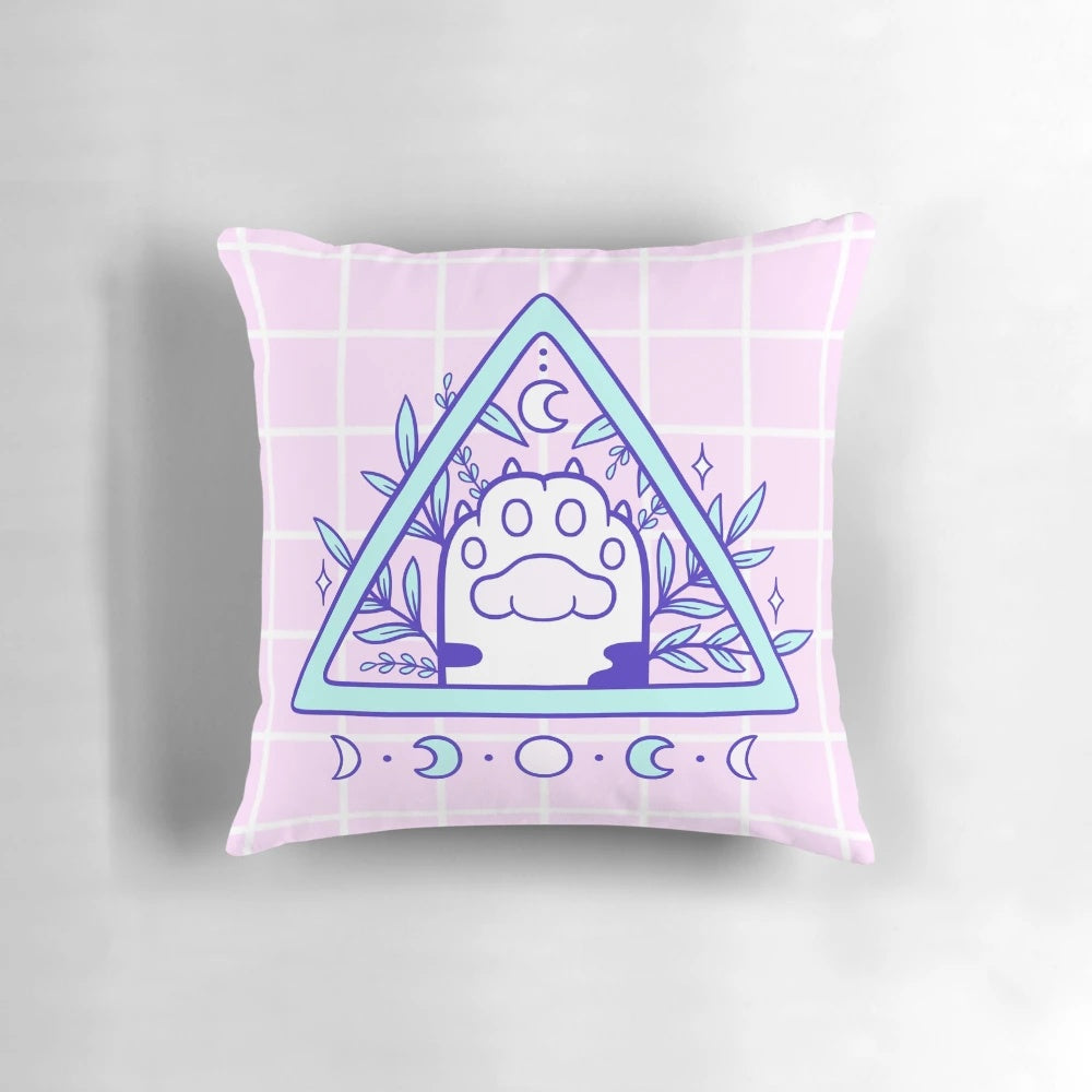 Witchy cat paw pastel feline familiar design on a soft, white pillow