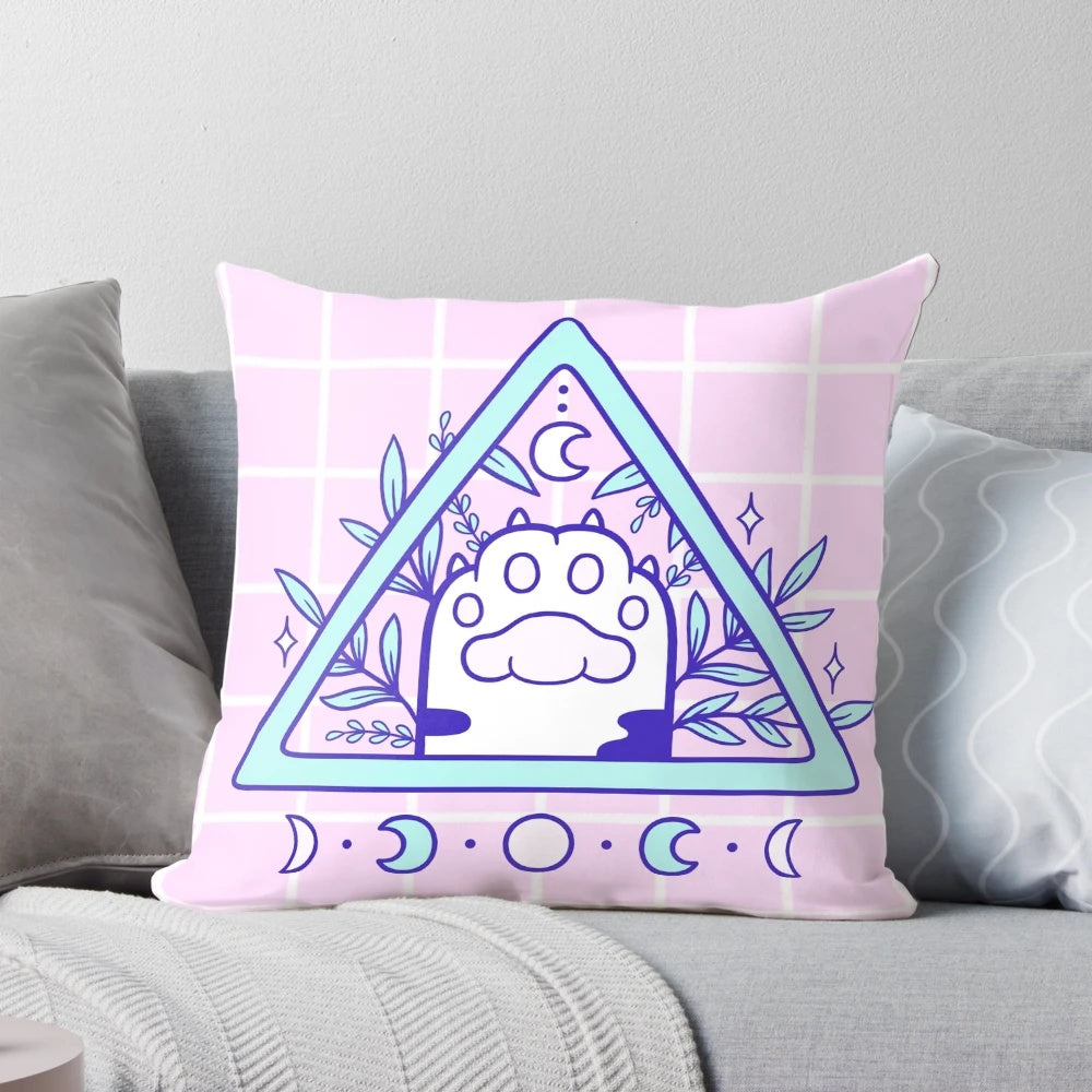 Witchy cat paw pastel feline familiar design on a soft, white pillow