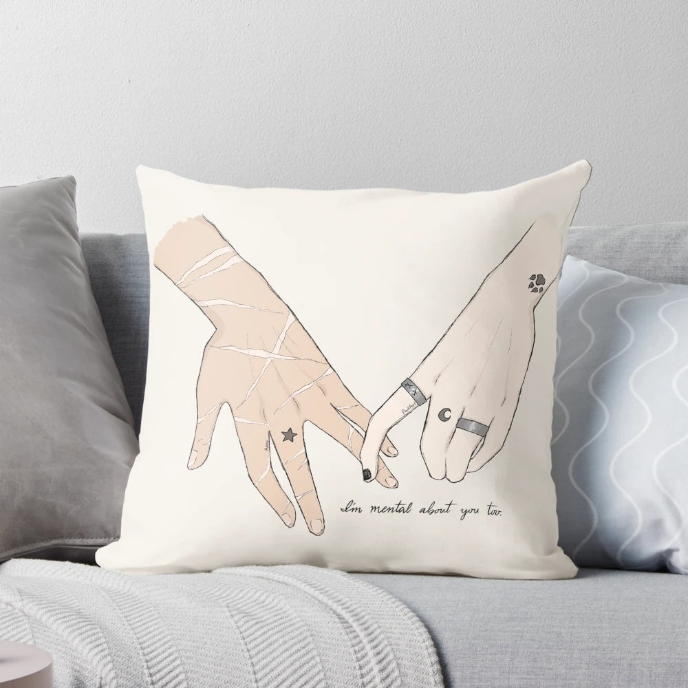 A cozy pillow featuring the hands of Sirius Black and Remus Lupin, characters from the Wolfstar Harry Potter fanfiction.