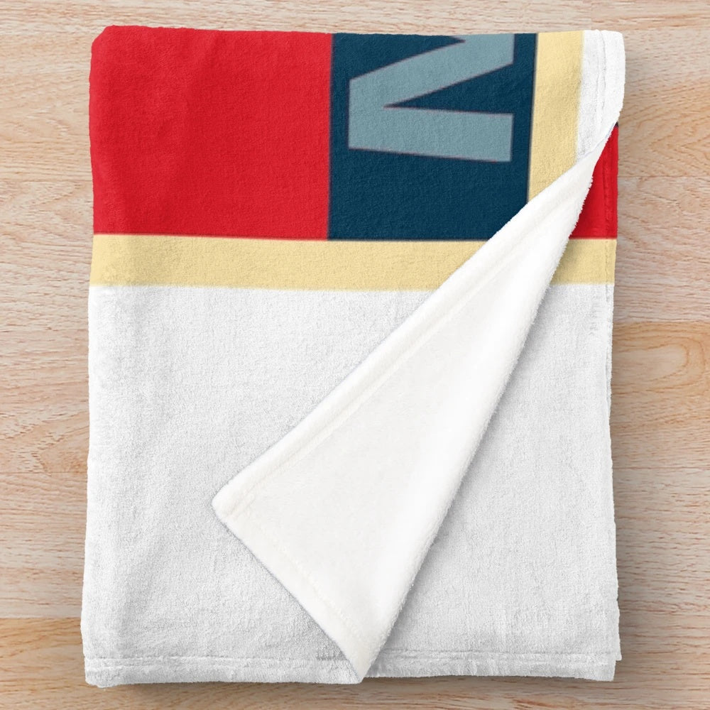 Women's plush blanket featuring a tribute design for Katie Meyer, a former collegiate goalkeeper
