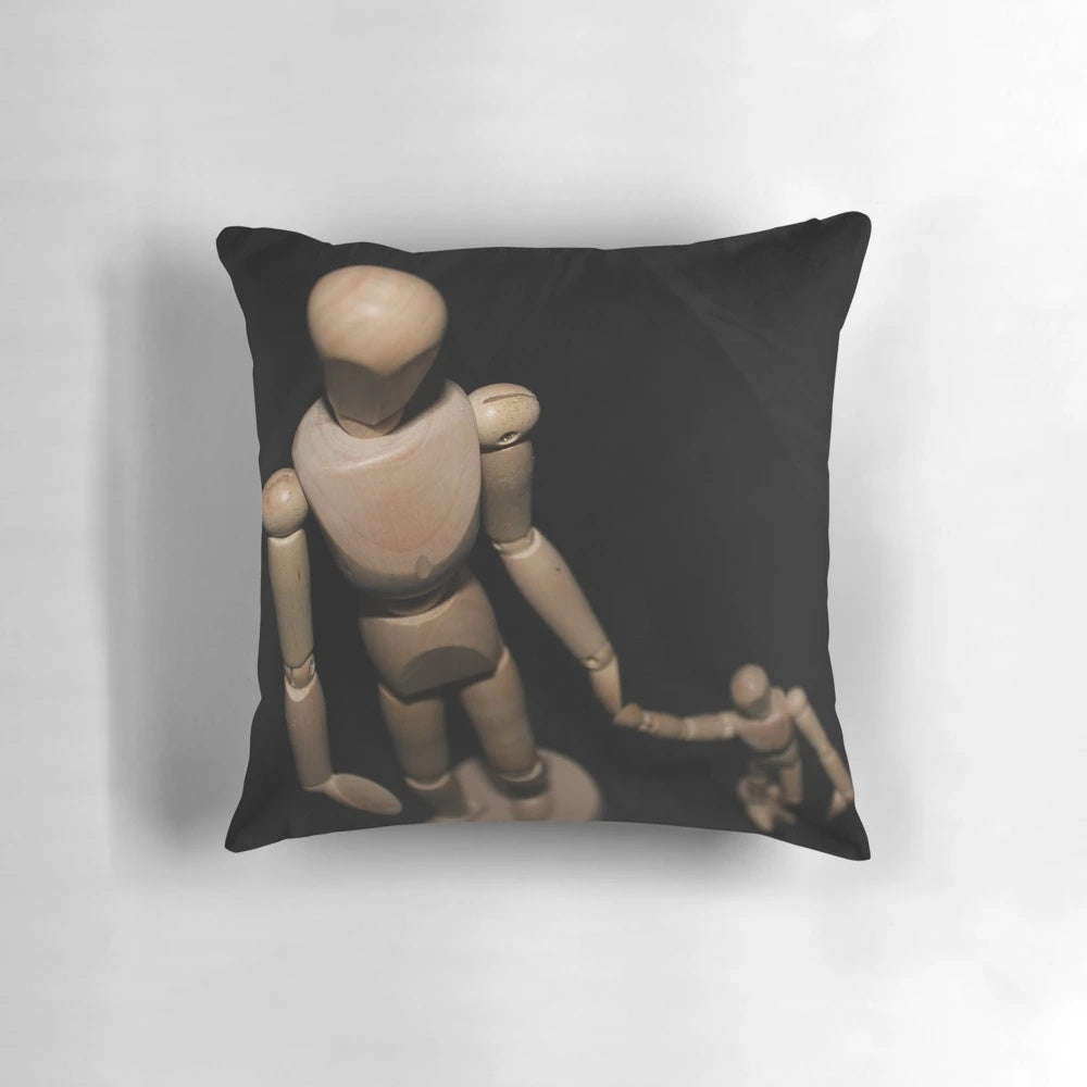 Wooden doll 'Take My Hand' pillow, a unique still life photography-inspired home decor item and gift