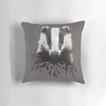 Woodland-themed black, white, and grey badger print pillow with twig details