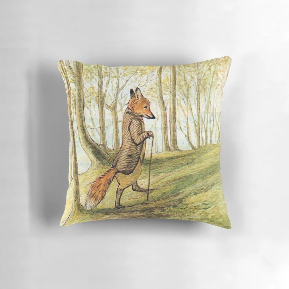A decorative pillow featuring an illustration of the character Mr. Tod from Beatrix Potter's classic tales, set in a forest landscape.
