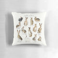 A decorative throw pillow featuring illustrations of various rabbit and hare species in a natural, wildlife-inspired design.