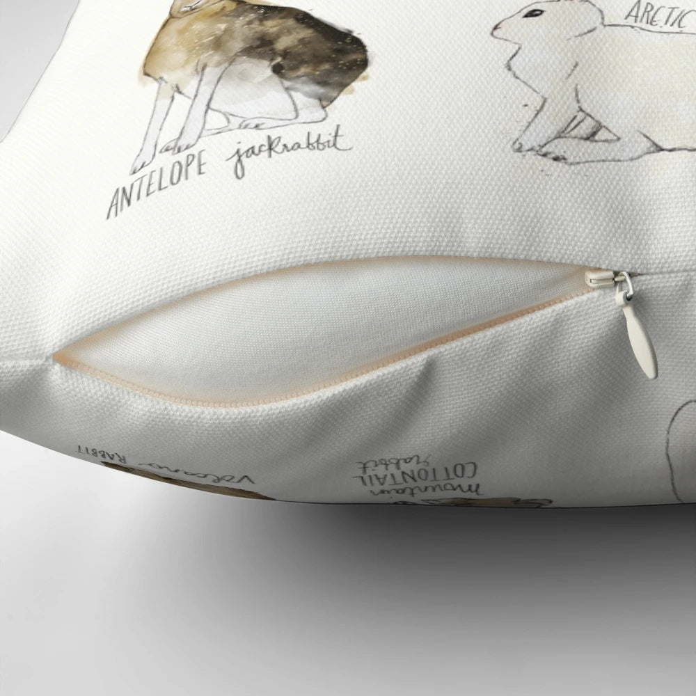 A decorative throw pillow featuring illustrations of various rabbit and hare species in a natural, wildlife-inspired design.