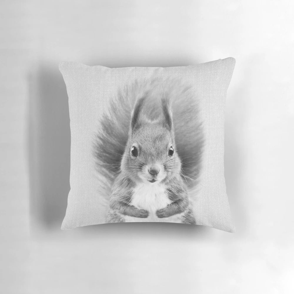Stylish black and white pillow featuring a portrait of a cute, curious squirrel in a minimalist, nature-inspired design.